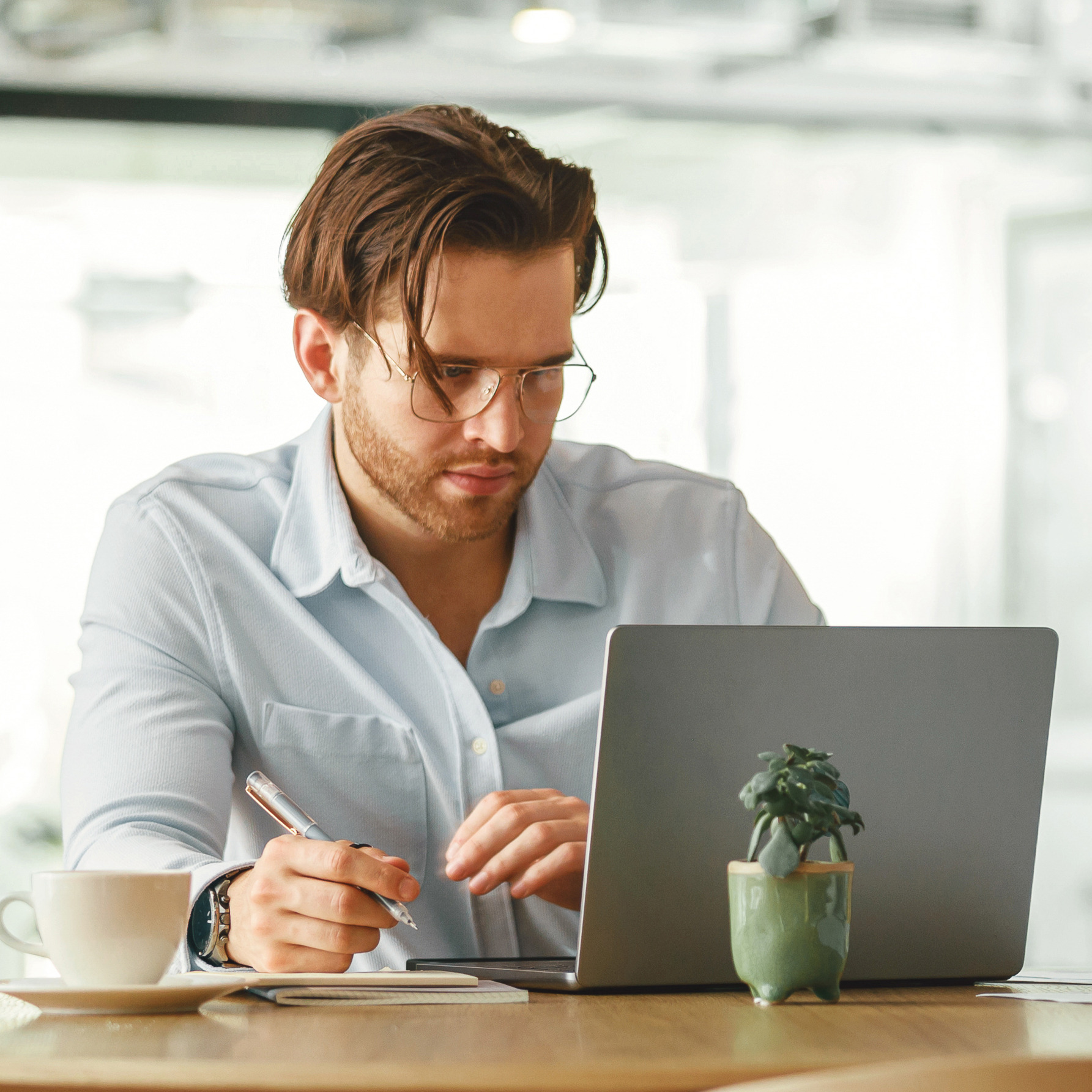 Man Focused On Studying Online